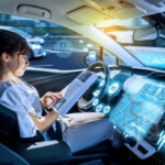 young woman reading a magazine in a autonomous car. driverless car. self-driving vehicle. heads up display. automotive technology.